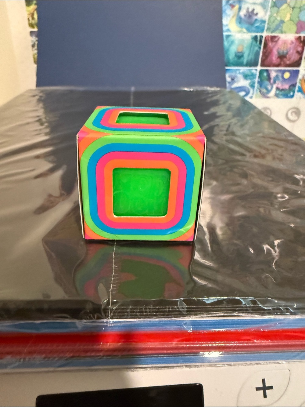 Neon Multi-Color Cube Toy with Bright Green Center